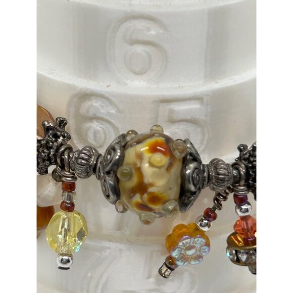 Artisan Lampwork Glass Bracelet With Amber Gold Swirl and Faceted Beads - Picture 11 of 16